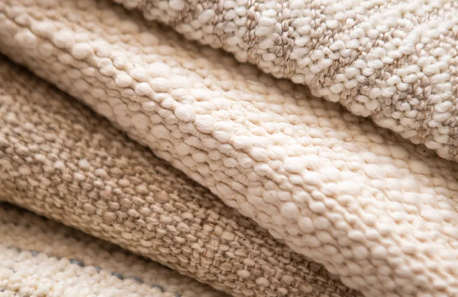 Detail van een geweven structuurstof. Stoffen van Threads.